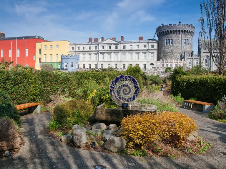 A majestic building with a towering structure, Dublin Castle stands tall, exuding grandeur and history.