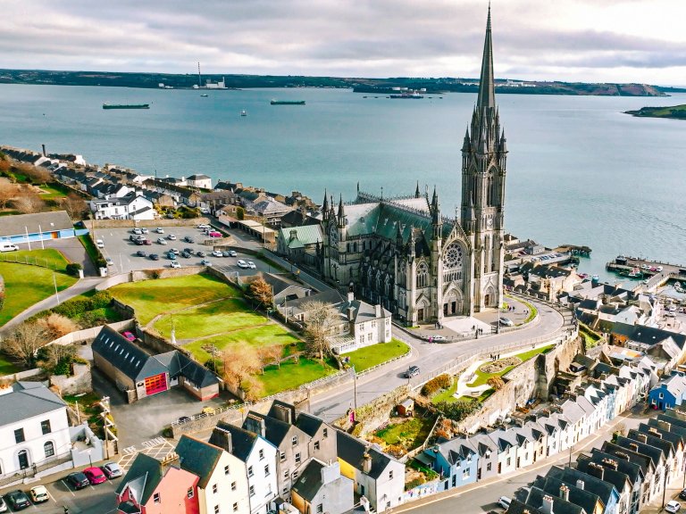 Aerial view of the Cathedral and colored houses in Cobh, Ireland ,colorful houses and St Colman's Cathedral in Cobh, Houses and catherdral in Cobh, colorful town